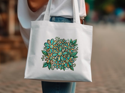 White canvas tote bag with a colorful floral design.