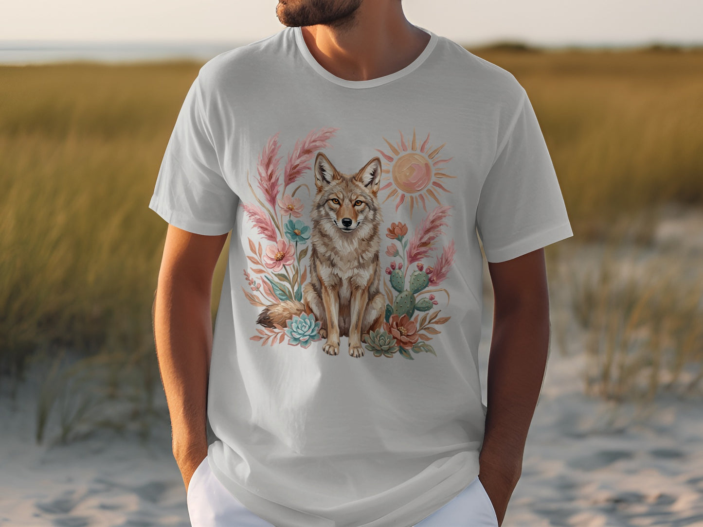 White t-shirt featuring a coyote, cactus, and sun graphic.