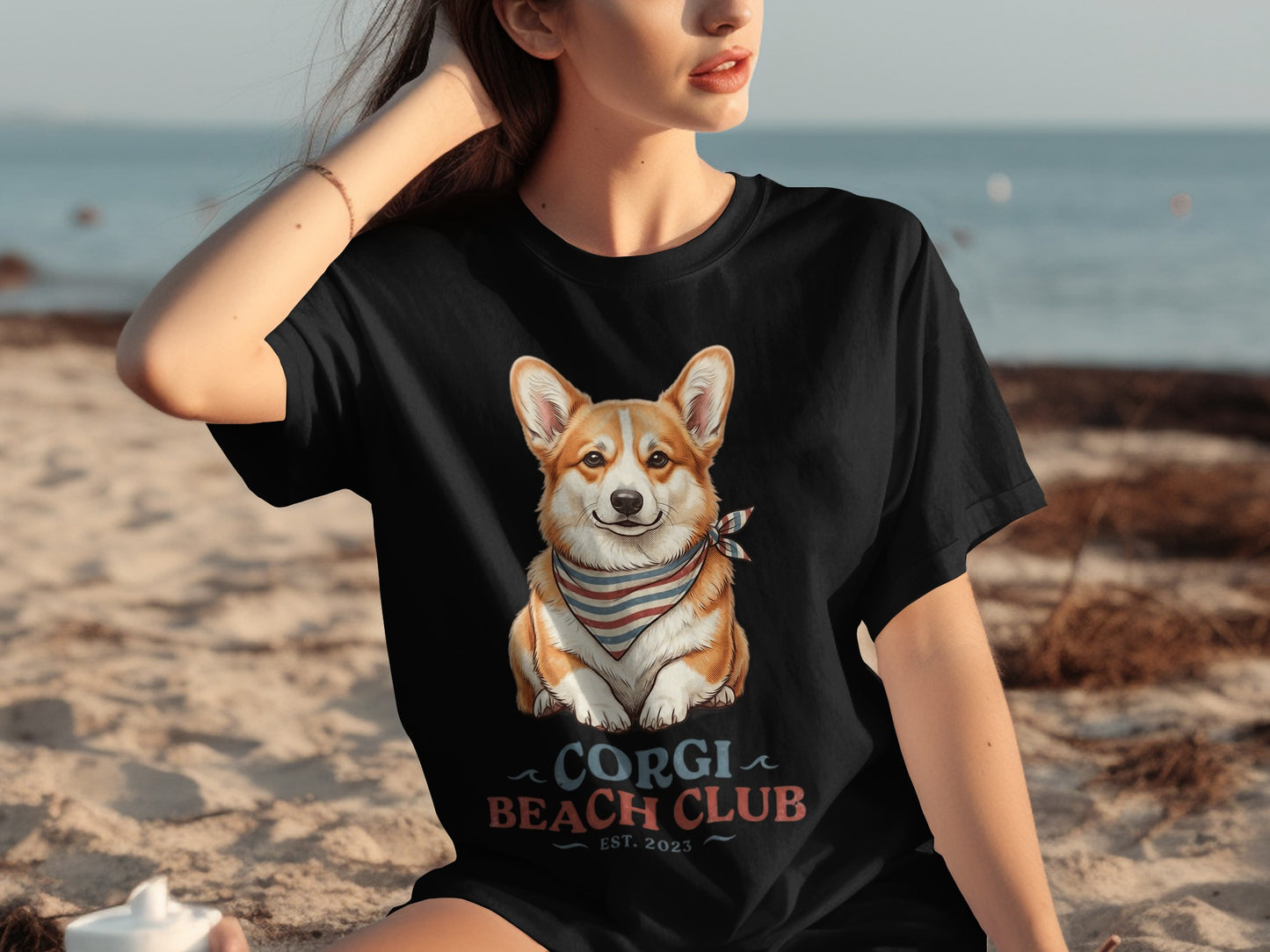 Black t-shirt with a smiling corgi wearing a bandana.