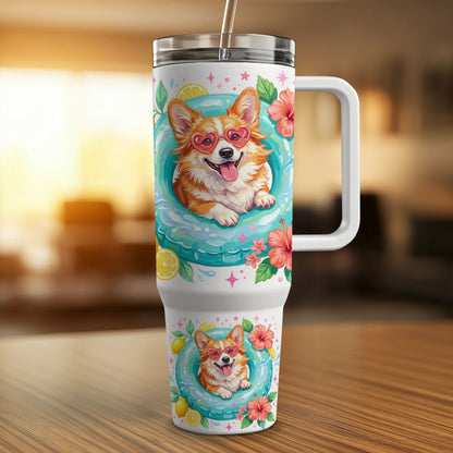 Corgi in sunglasses on a float surrounded by lemons and hibiscus flowers on a tumbler.