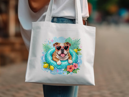 White tote bag with a bulldog in heart sunglasses on an inflatable ring.