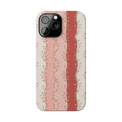 Phone case with vertical floral stripes in shades of pink and beige.