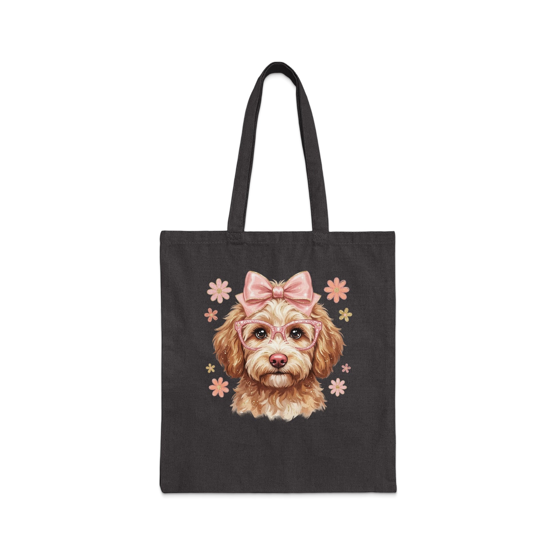 Dark tote bag with a cartoon dog wearing pink glasses and a bow.