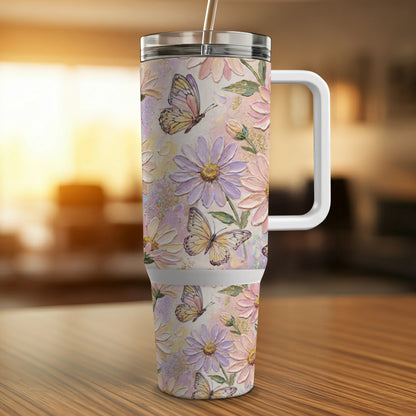 Floral tumbler with butterflies and a textured, painterly design.