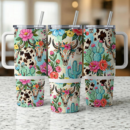 Three tumblers with floral and cow print designs.