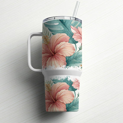 White tumbler with hibiscus flowers and leaves, featuring a straw.