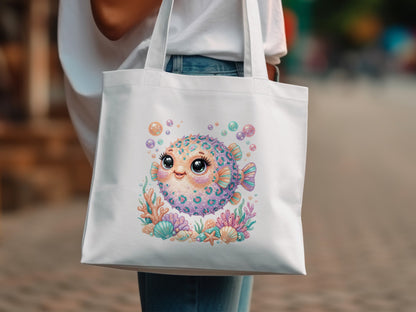 White tote bag with colorful cartoon pufferfish, bubbles, coral, and starfish.