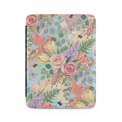 Floral pattern with roses, tulips, and bees on a textured background.