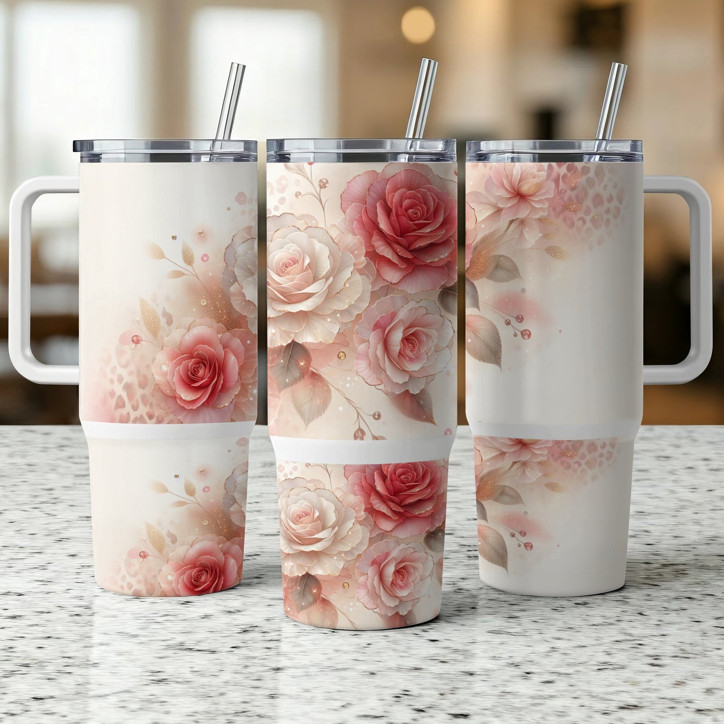 Three insulated tumblers with a floral rose design and handles.