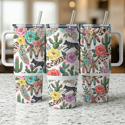 Three tumblers with floral, cactus, feather, and wolf skull designs.