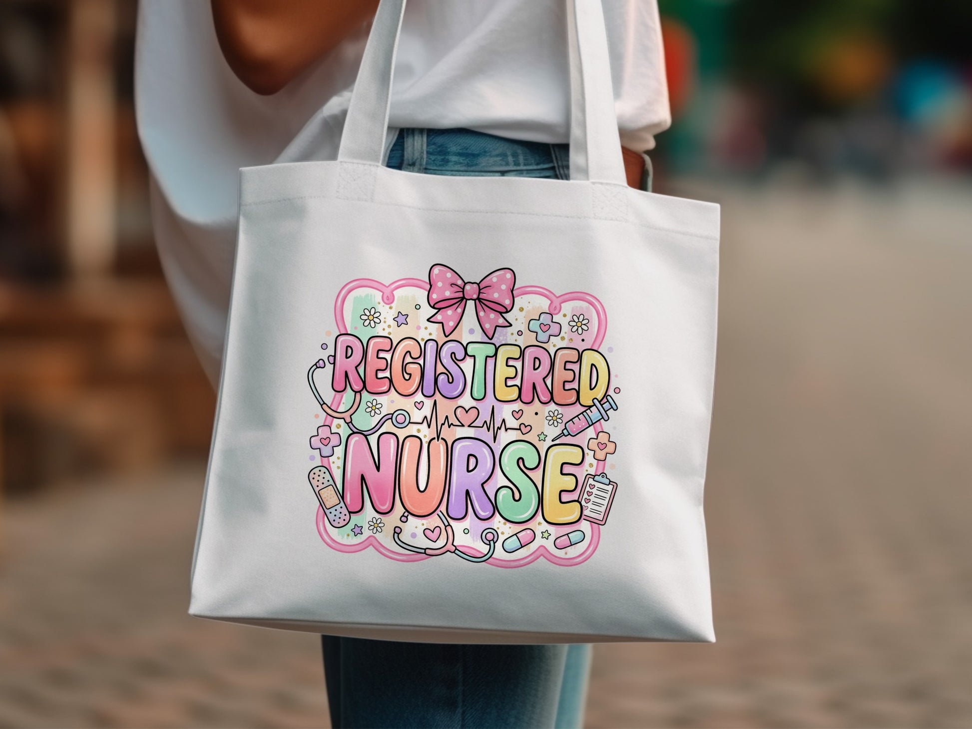 White tote bag with "Registered Nurse" text and medical icons.
