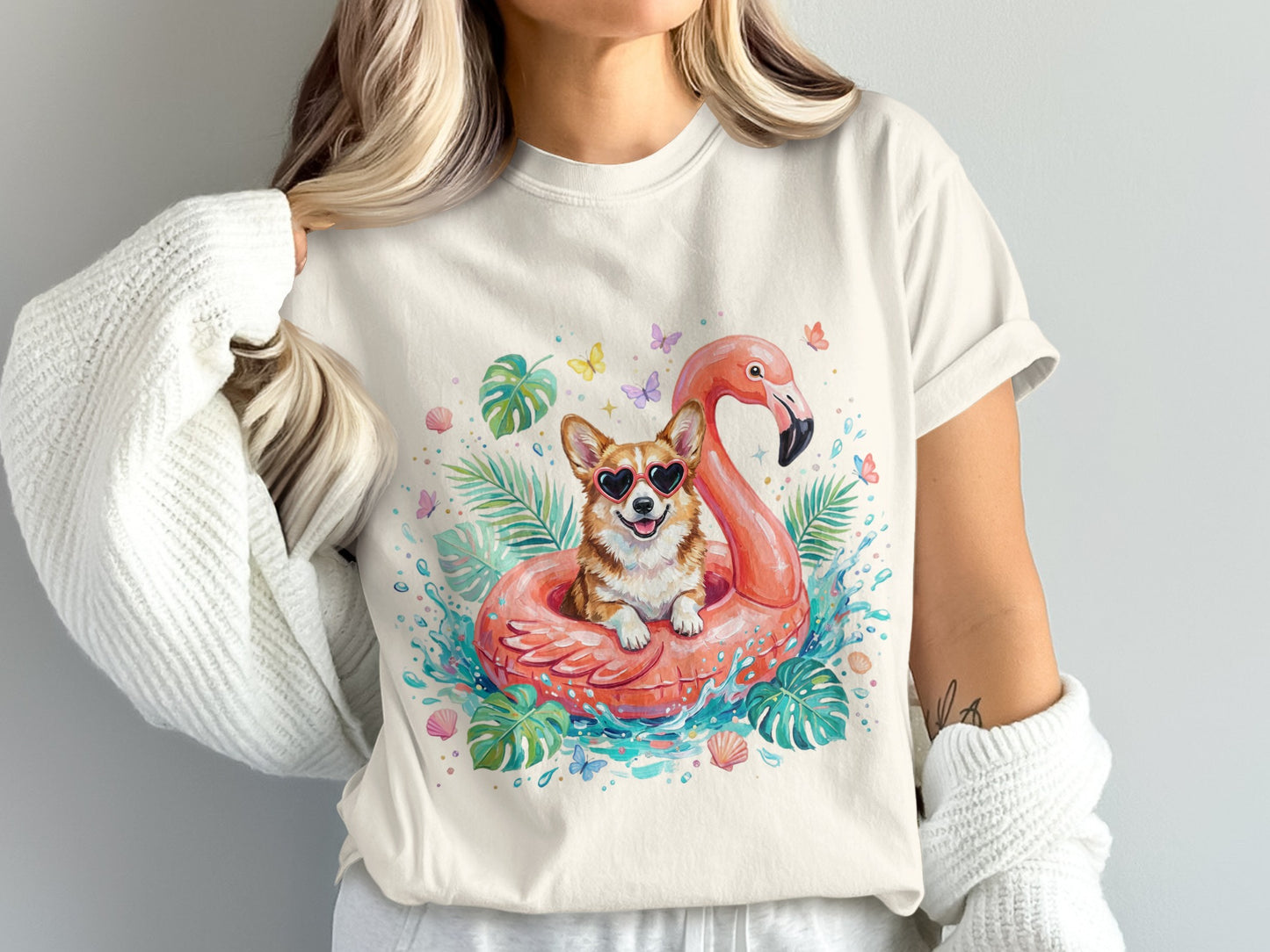 Corgi in flamingo float with heart sunglasses and tropical leaves.