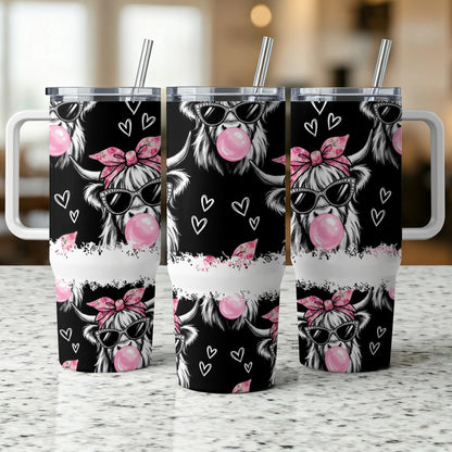 Three tumblers with a cow wearing sunglasses blowing bubblegum, hearts, and bows.