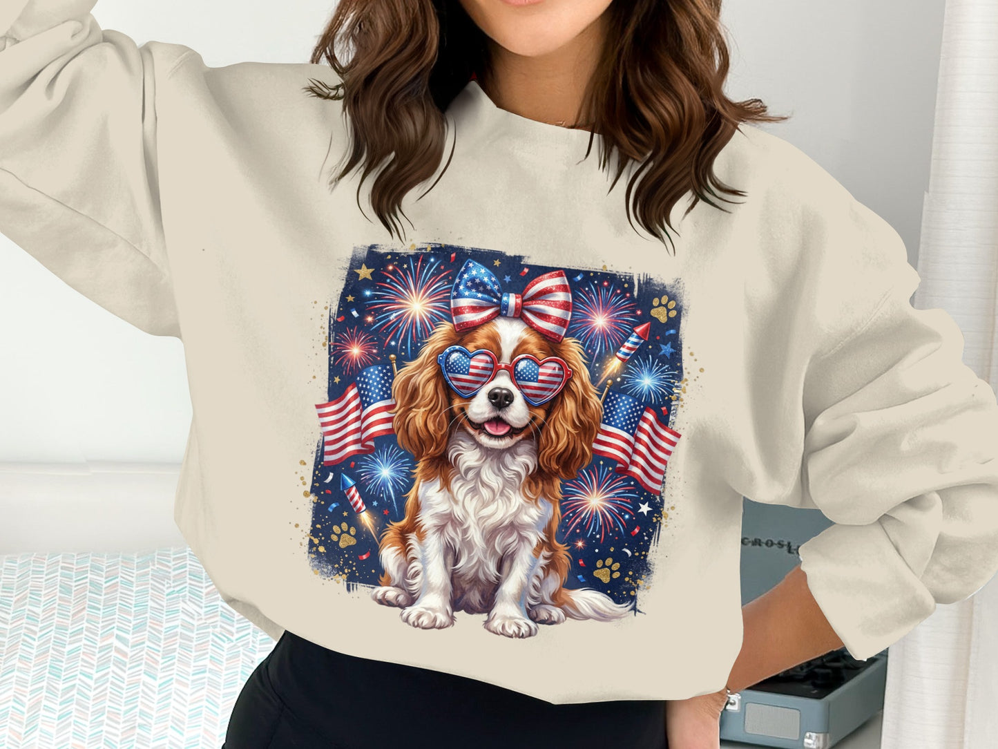 Woman wearing patriotic sweatshirt with dog and fireworks graphic.