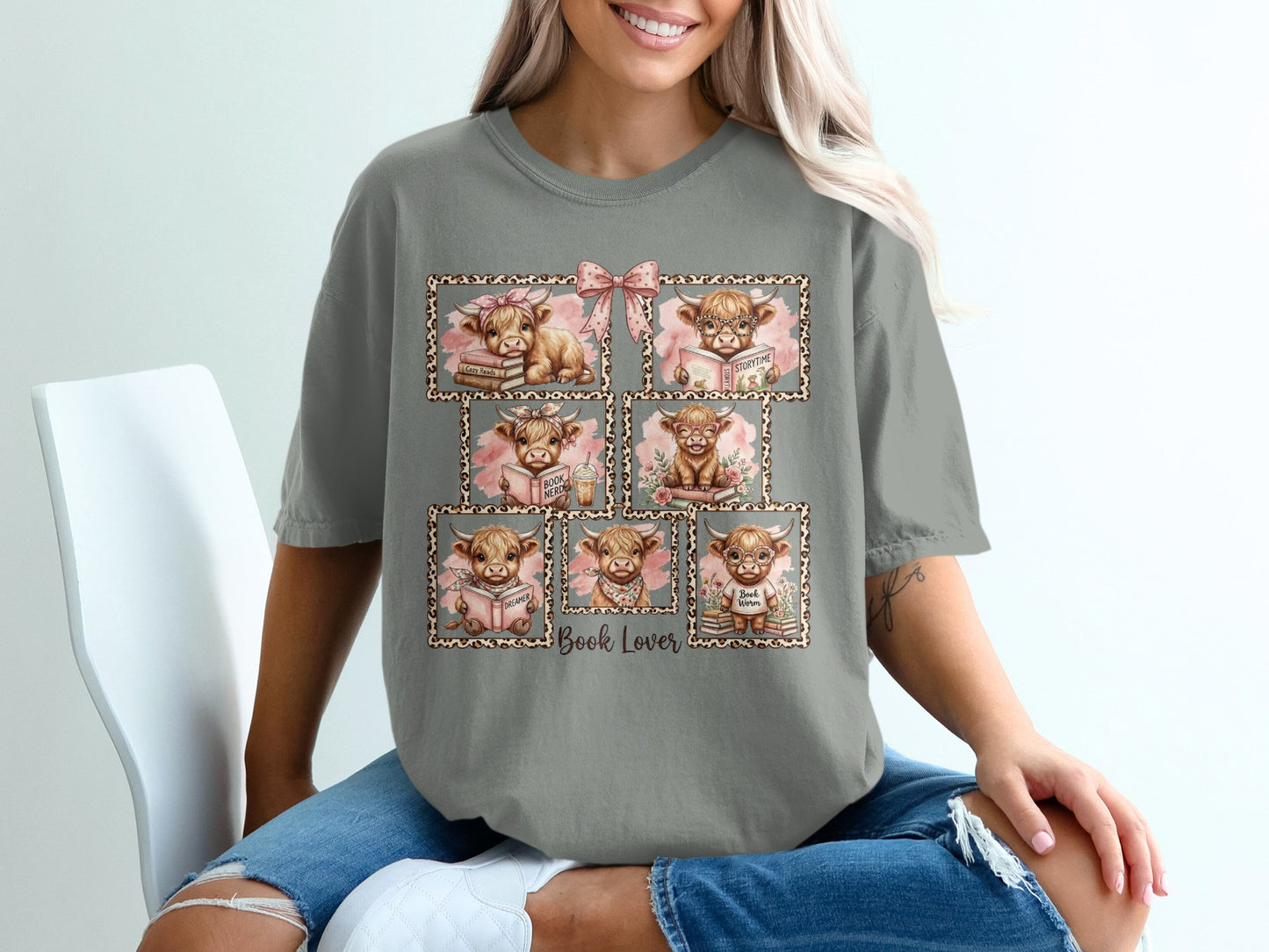 Framed illustrations of highland cows reading books, with "Book Lover" text.
