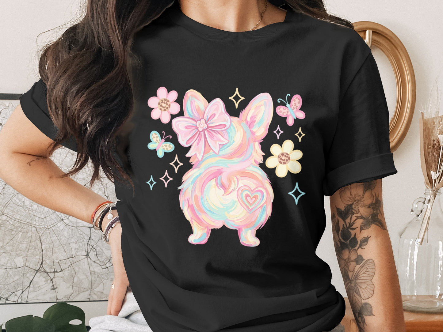 French Bulldog with pastel colors, flowers, and butterflies on a black t-shirt.