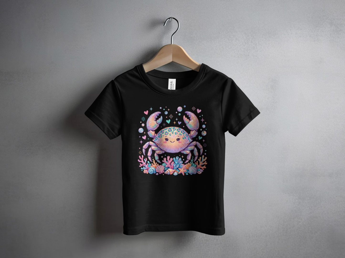Black t-shirt with a smiling crab surrounded by colorful seashells and hearts.