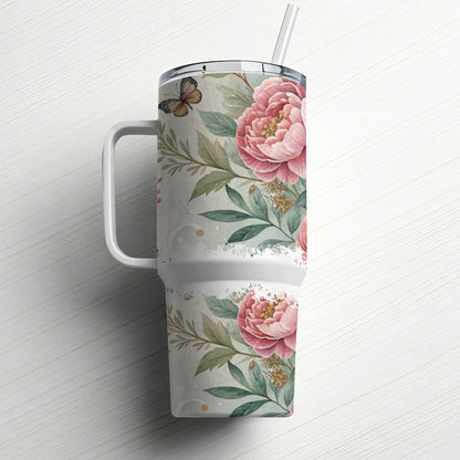 White tumbler with pink peonies, greenery, and a butterfly pattern.