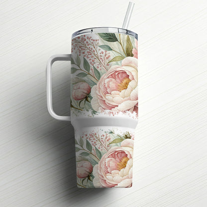 White tumbler with pink peony floral pattern and straw.