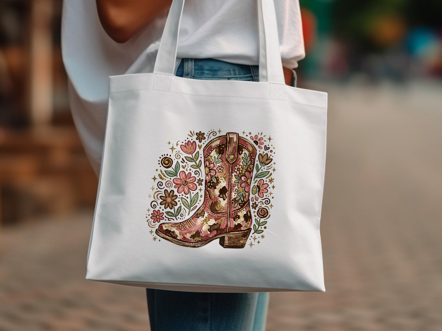 White tote bag with floral cowboy boot design.