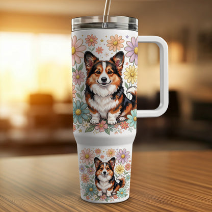 Corgy on a floral pattern travel tumbler with handle and straw.