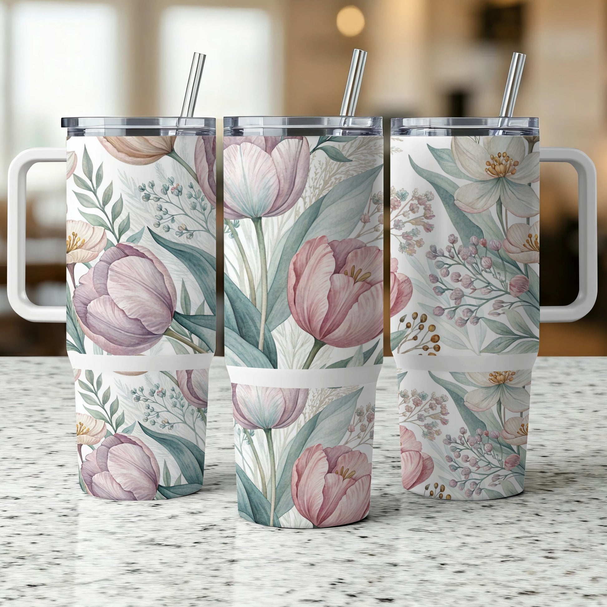 Three tumblers with a delicate pink and white floral pattern.