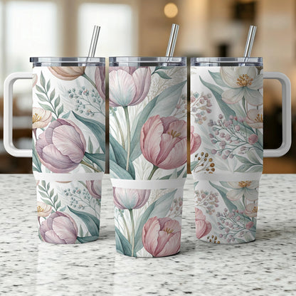 Three tumblers with a delicate pink and white floral pattern.