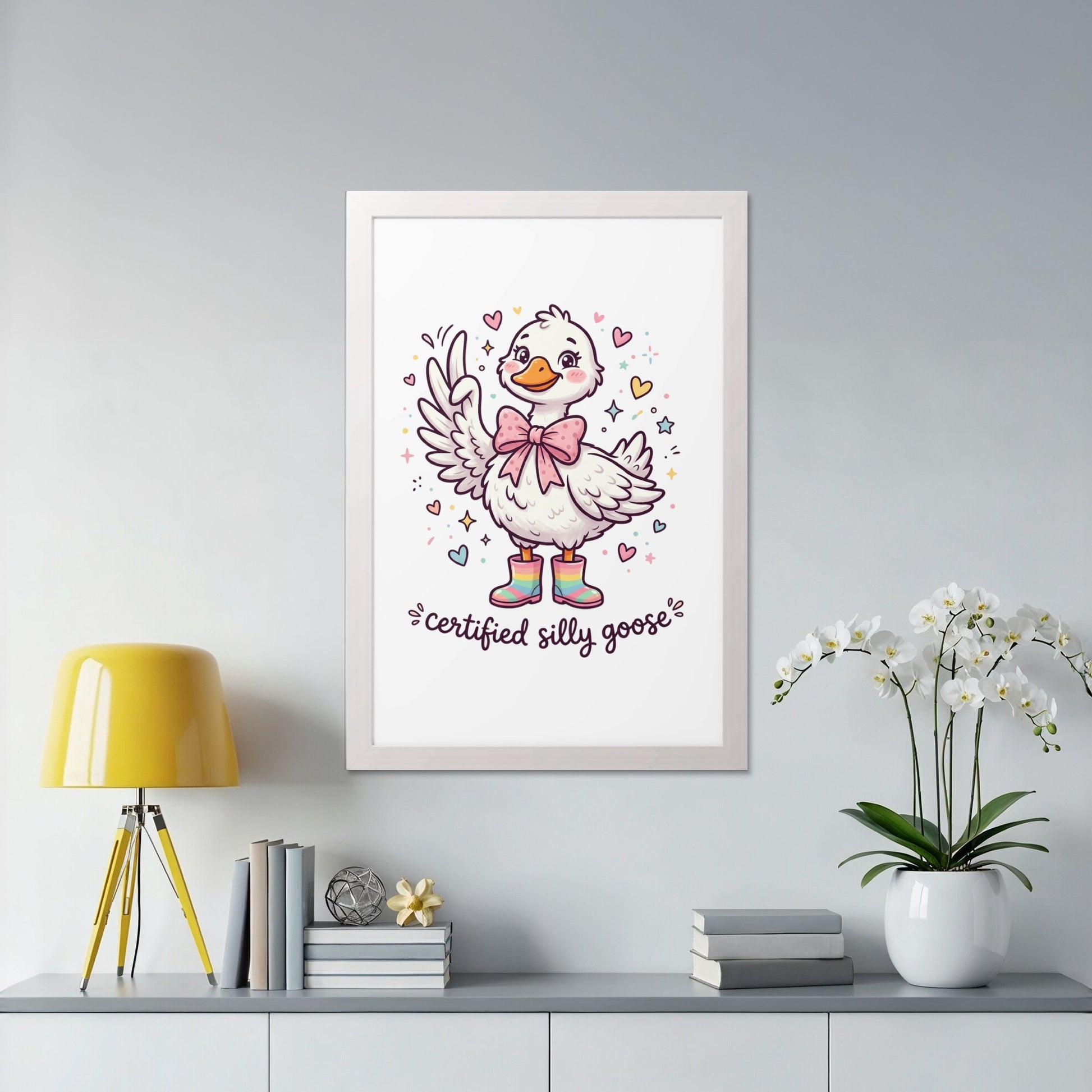 Cartoon goose wearing a pink bow and colorful boots, holding a peace sign.