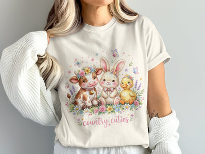 Cream t-shirt with "country cuties" text and a cow, bunny, and chick in flowers.