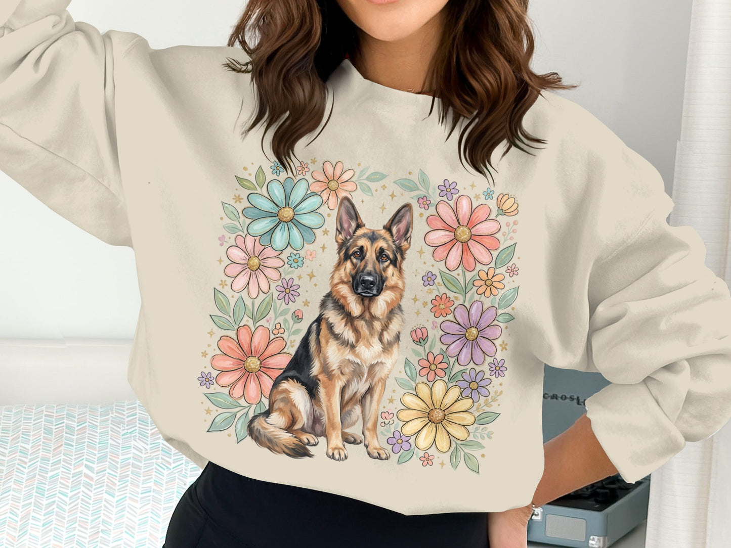 German Shepherd dog in floral wreath on cream sweatshirt.