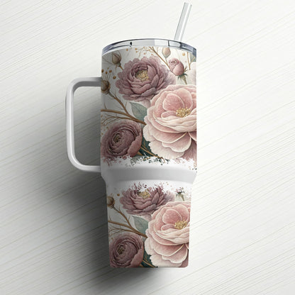White tumbler with a muted floral pattern and a straw.