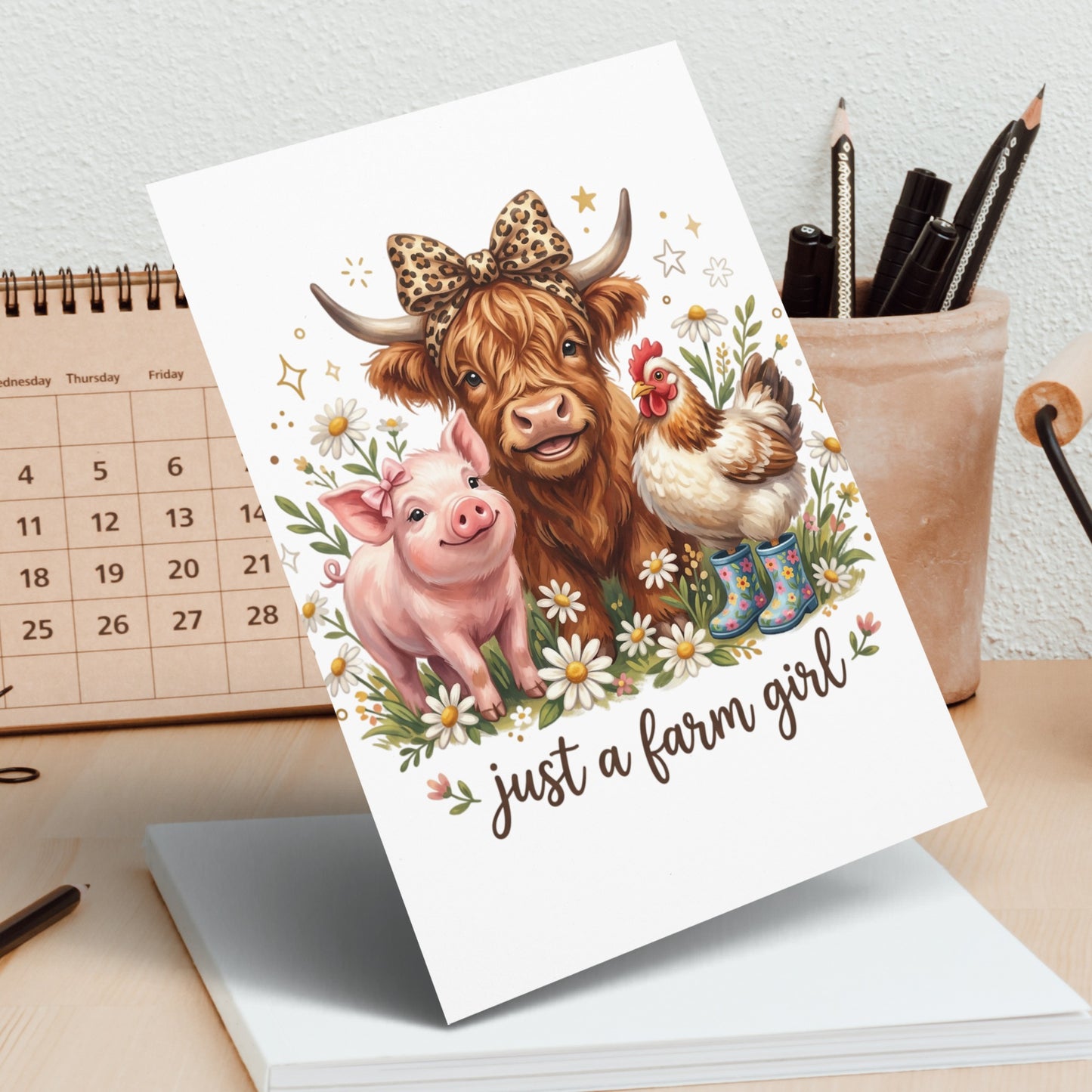 Card featuring a pig, cow with leopard print bow, and chicken with boots.