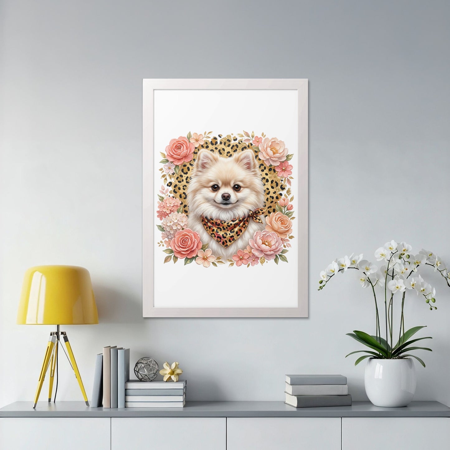 Framed painting of a Pomeranian wearing a bandana, surrounded by flowers.