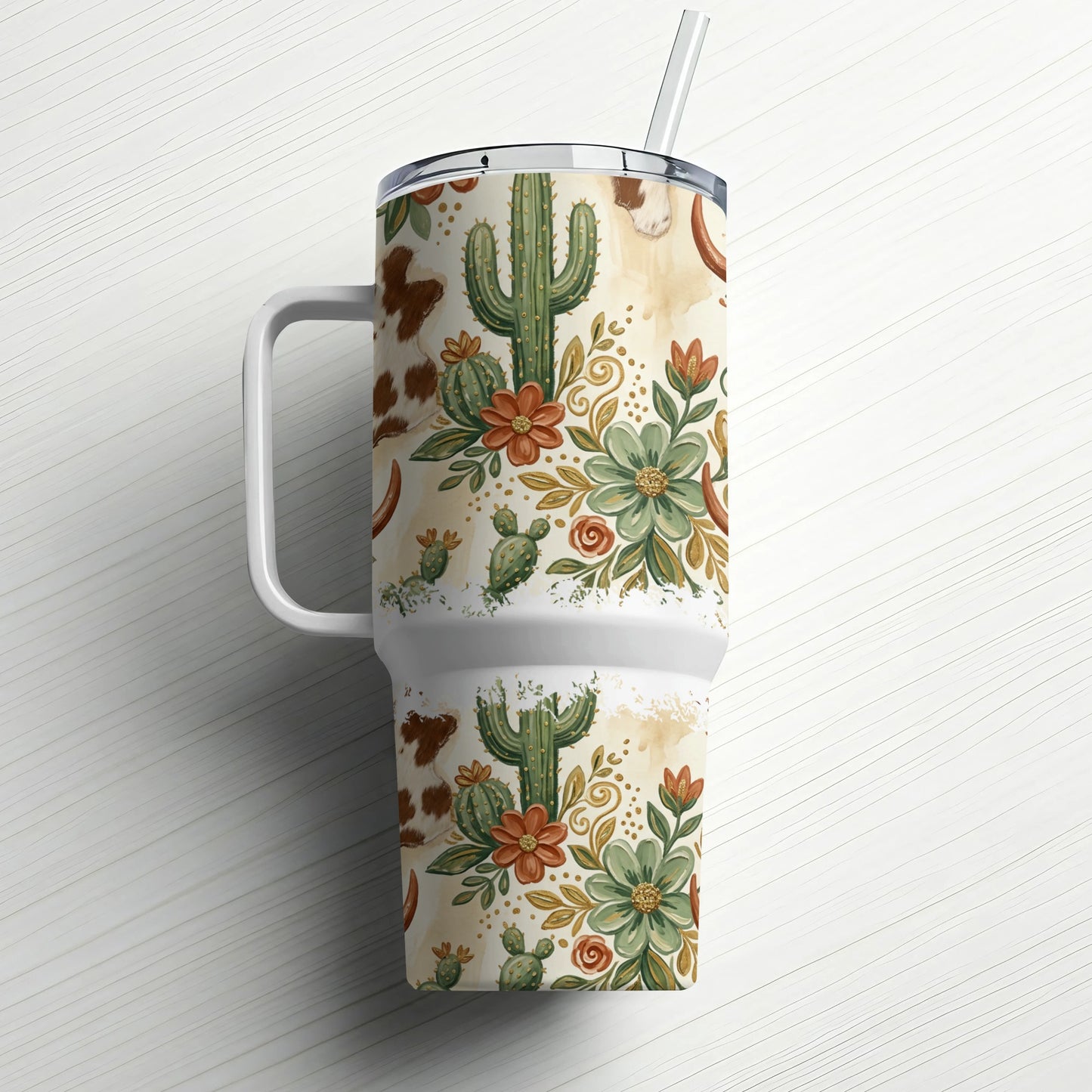 White tumbler with western cactus and floral pattern, featuring a straw.