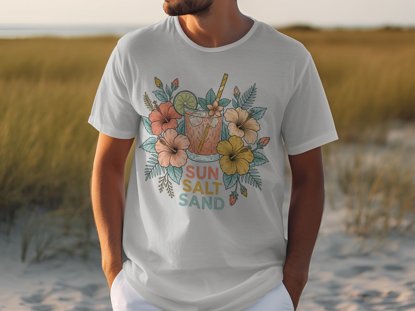 White t-shirt with a floral sun, sand, and drink graphic.