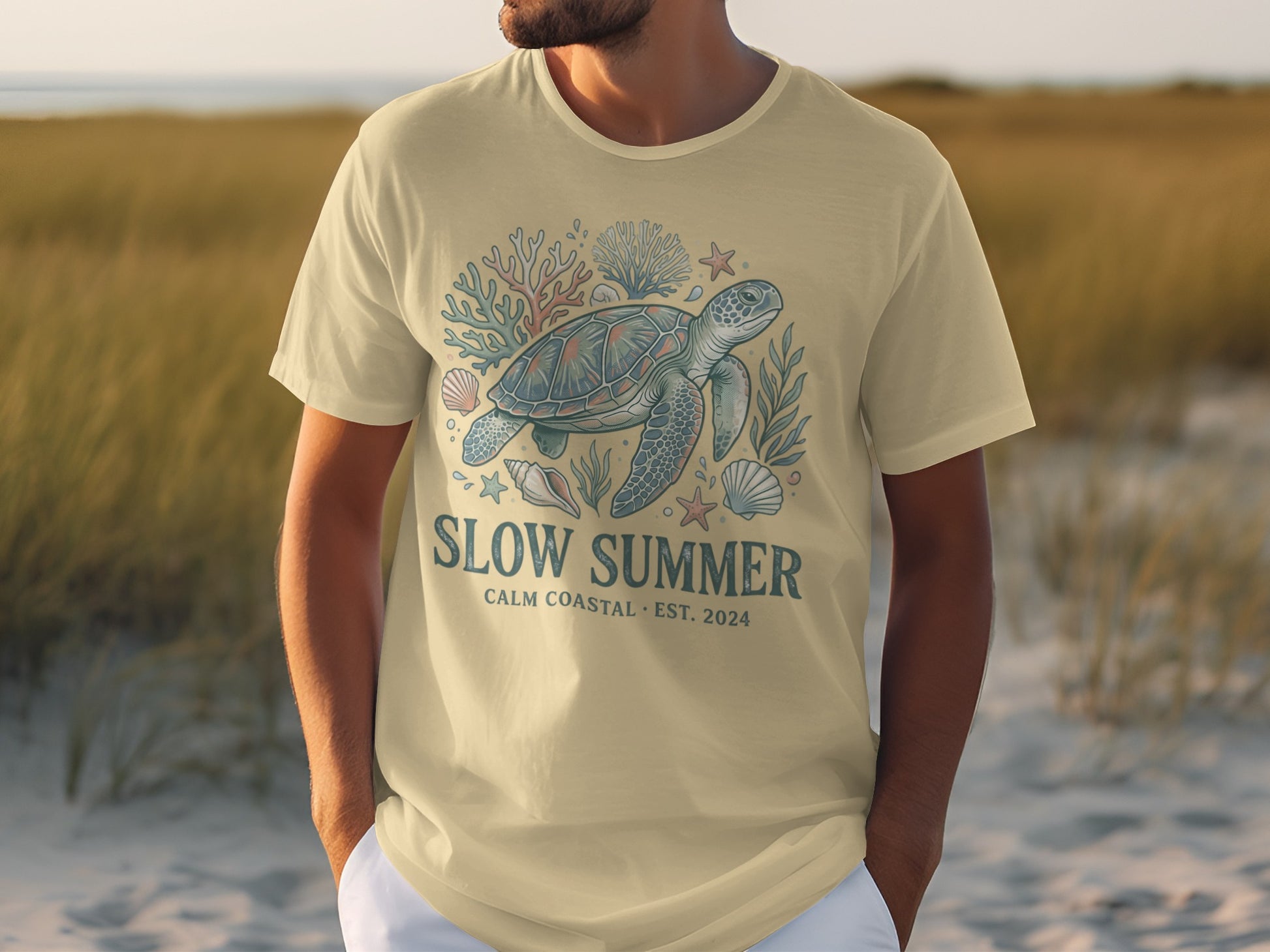 Cream t-shirt with a sea turtle graphic and "Slow Summer" text.