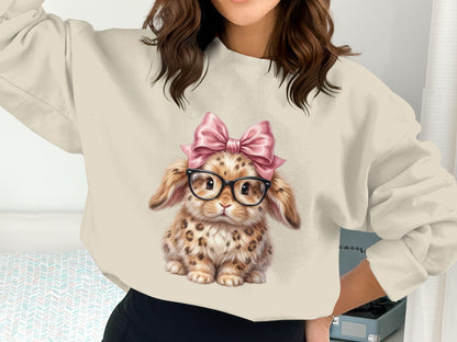 Cream sweatshirt with a leopard print bunny wearing glasses and a pink bow.