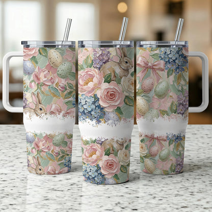 Three Easter-themed tumblers with bunnies, flowers, and eggs.