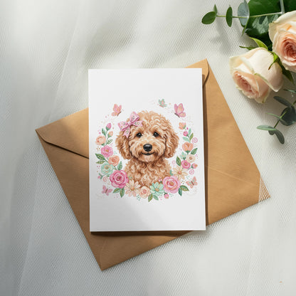 Card featuring a curly-haired dog surrounded by flowers and butterflies.