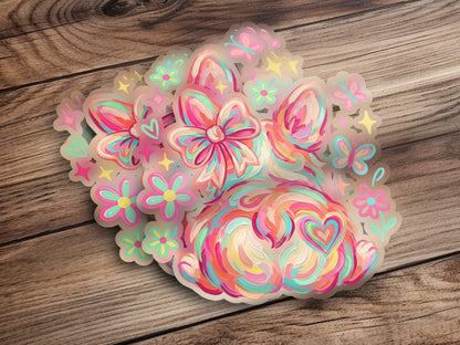 Colorful glitter sticker with a bunny, flowers, and butterflies.