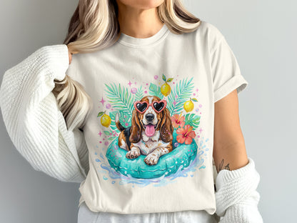 Basset hound wearing heart sunglasses in a floaty.