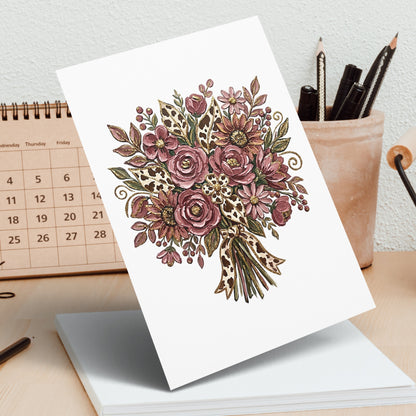 Floral bouquet with leopard print ribbon on desk calendar background.