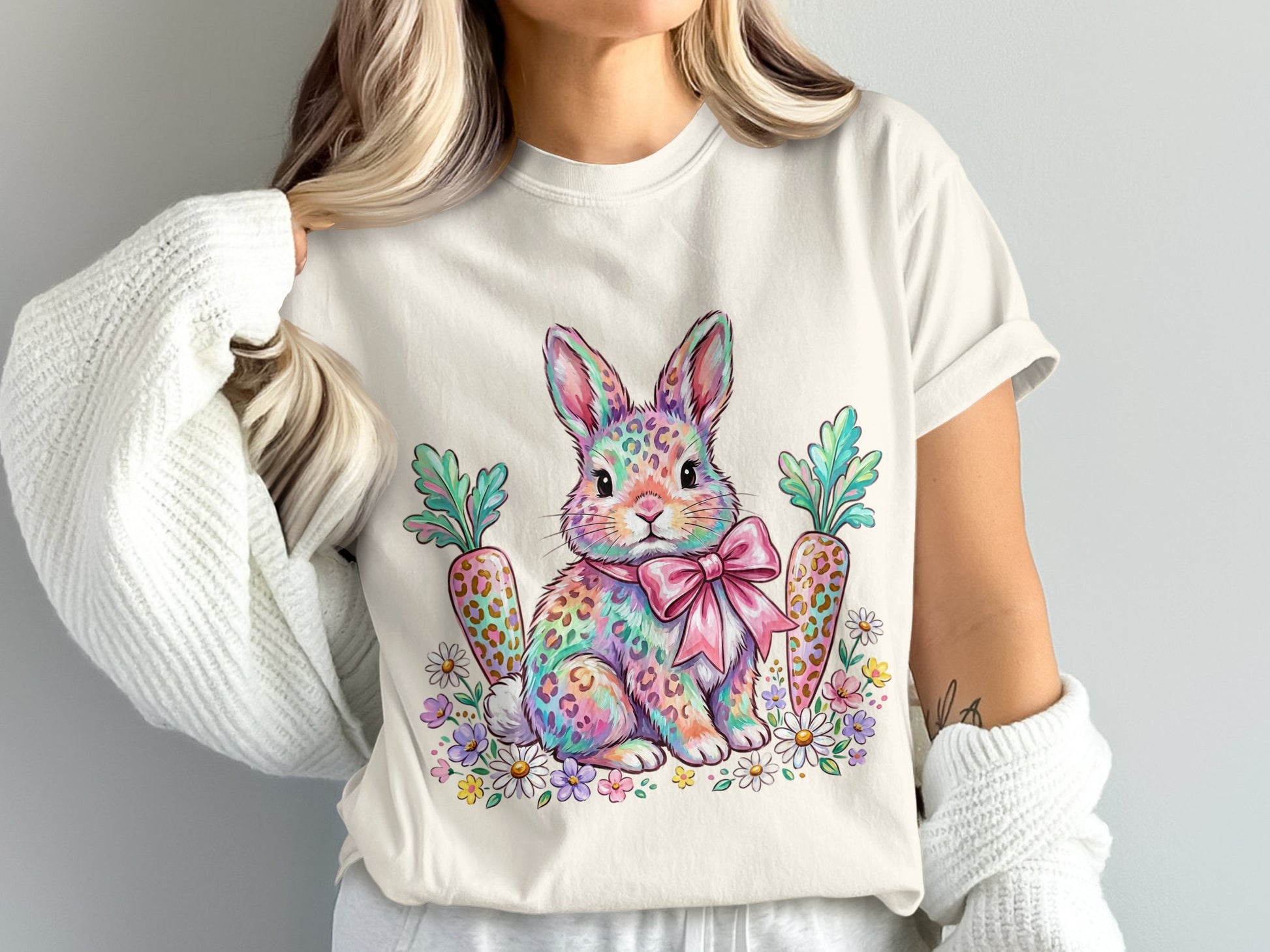 Colorful leopard print Easter bunny with carrots and flowers on a t-shirt.