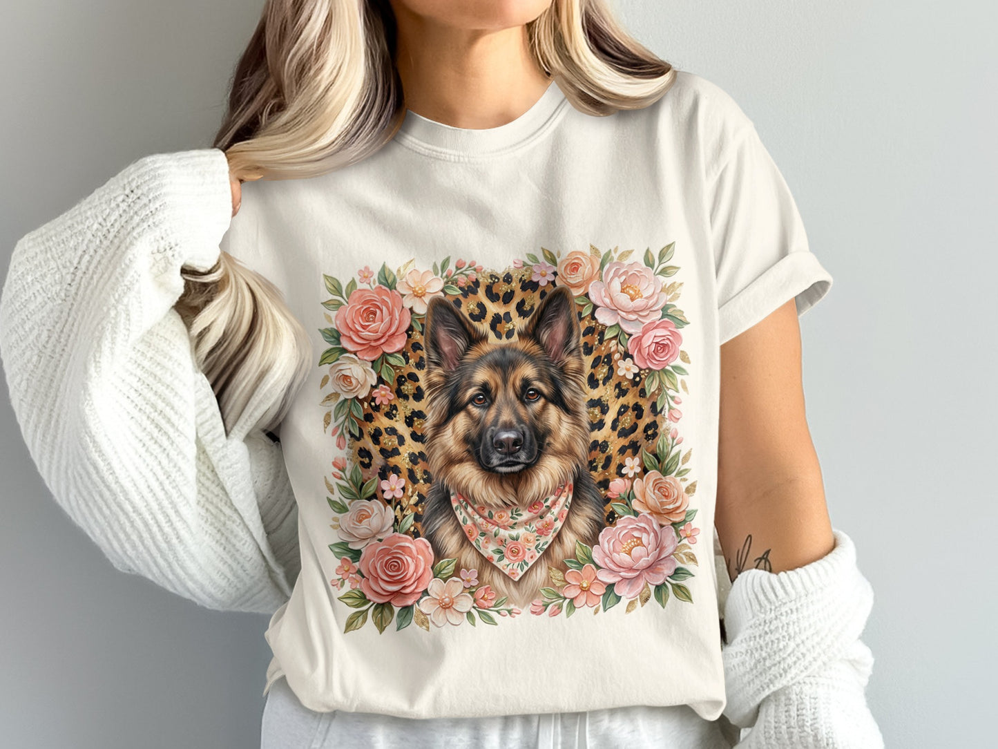 German Shepherd wearing bandana, surrounded by floral border.