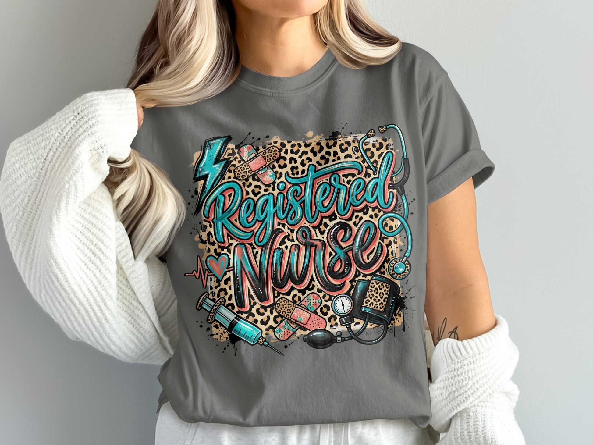 Registered Nurse text with medical icons and leopard print on a gray t-shirt.