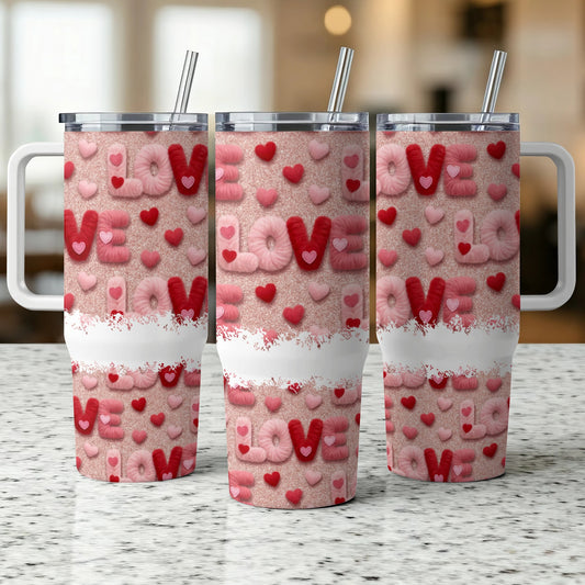 Three pink glitter tumblers with "LOVE" in fuzzy letters and heart accents.