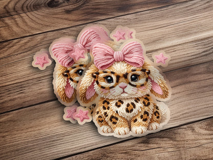 Cute bunny sticker with glasses, pink bow, and leopard print.