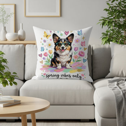 Corgi wearing glasses on a pillow with "Spring vibes only" and colorful flowers.
