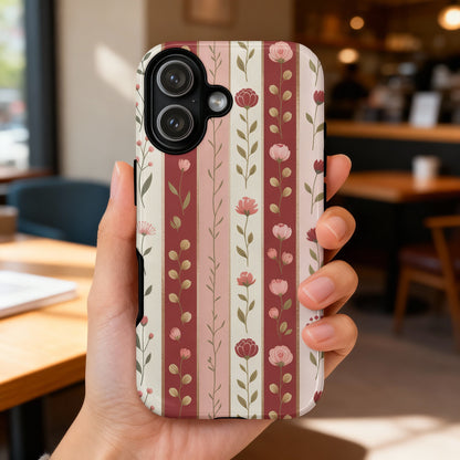 Phone case with vertical stripes and a floral pattern.