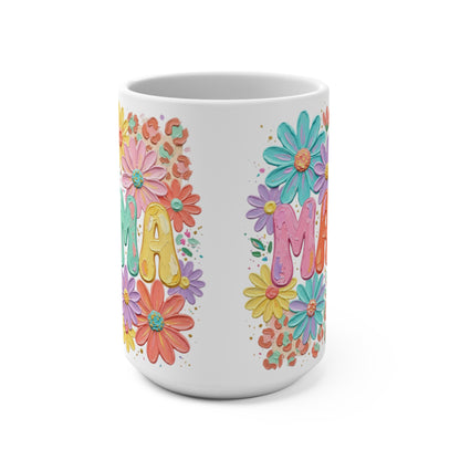 White mug with "MAMA" in colorful floral letters and leopard print accents.